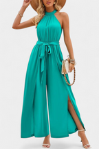 Asymmetrical One-Shoulder Jumpsuit with Bow Accent by Nyree